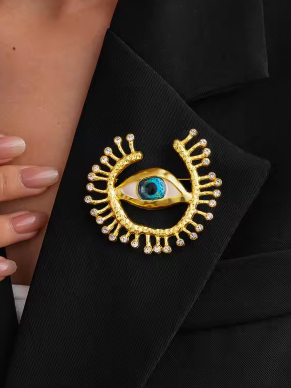 Gold-Tone Brooch with Blue Eye and Crystal Accents